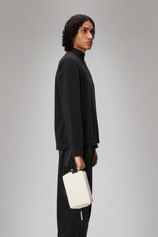 15580 - Accessori - rains